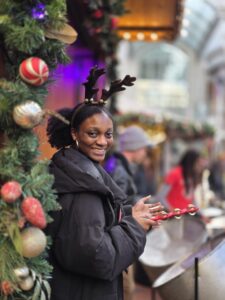 Aisha smile with Christmas baubles - RASPO Calypso & Carols 2025 image by Julia Brazil